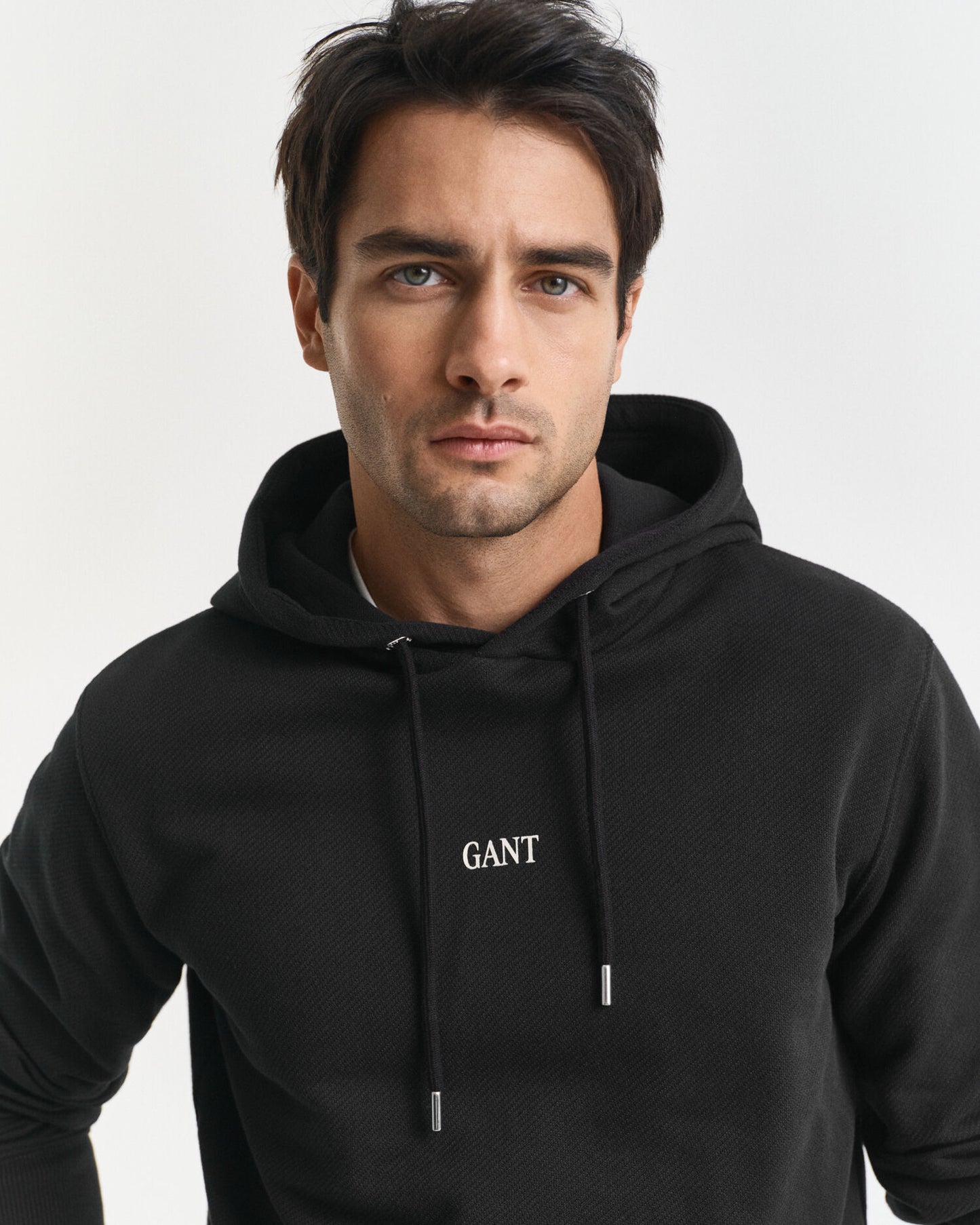 Sweat à capuche avec petit motif graphique