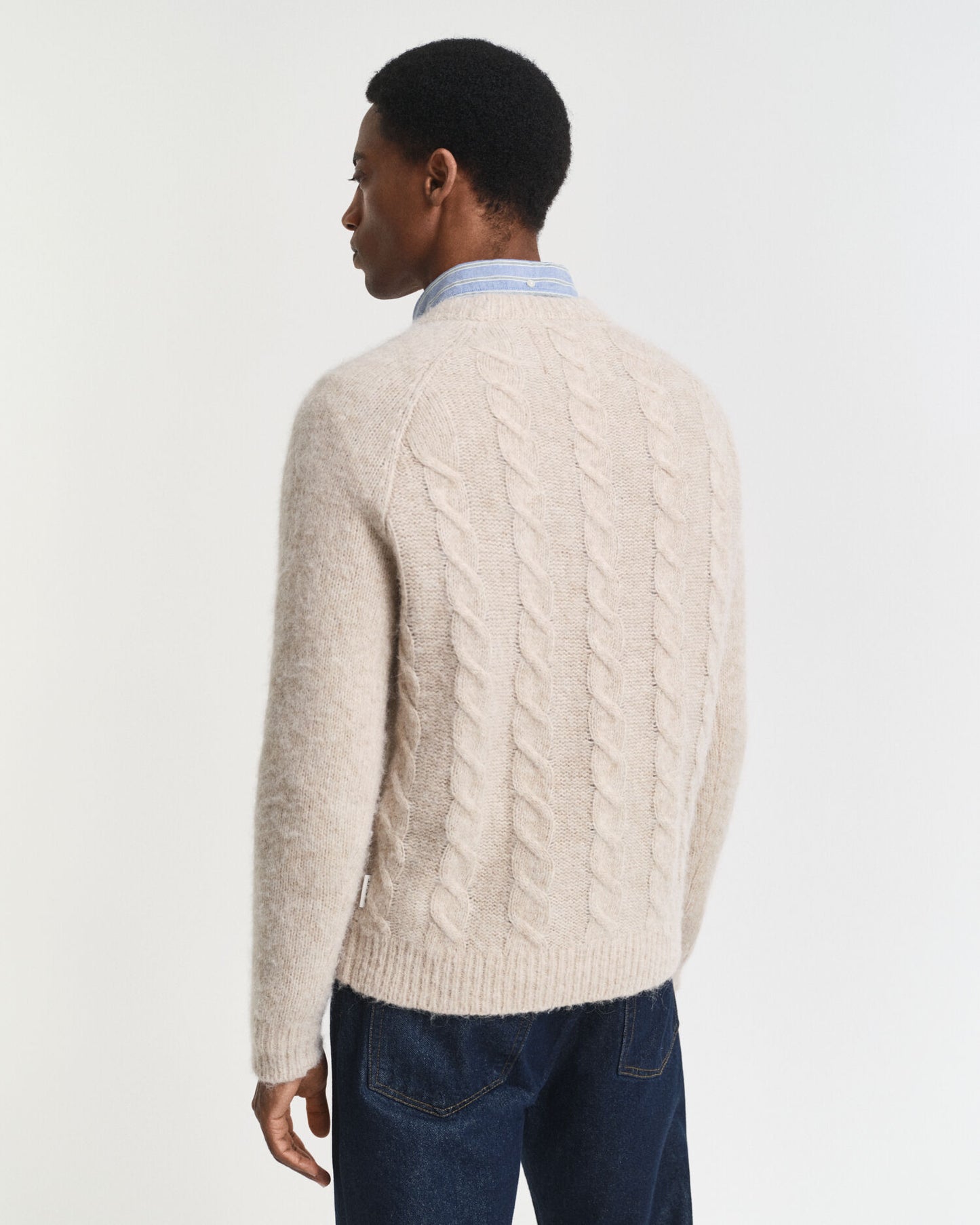 Pull ras du cou en maille torsadée
