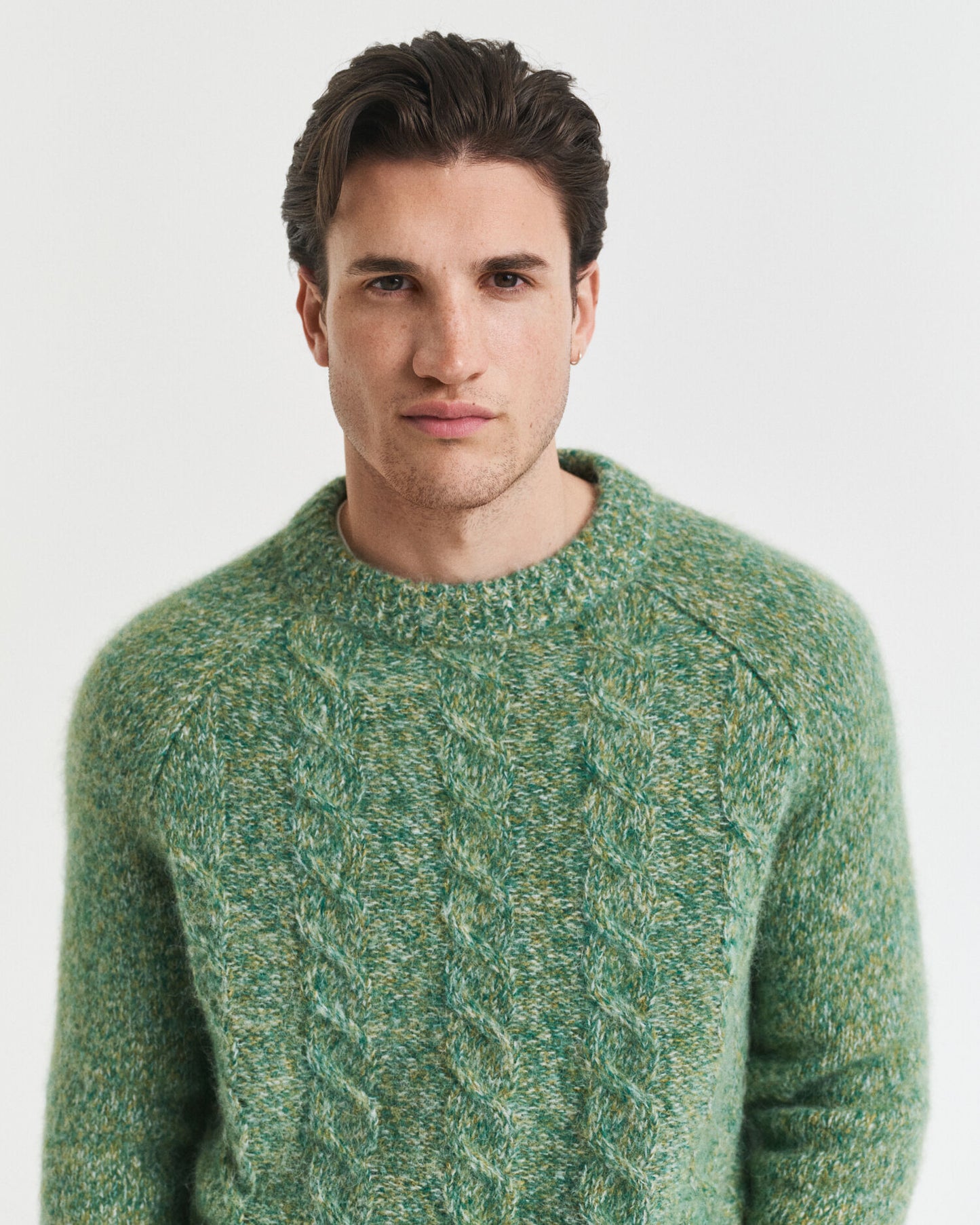Pull ras du cou en maille torsadée