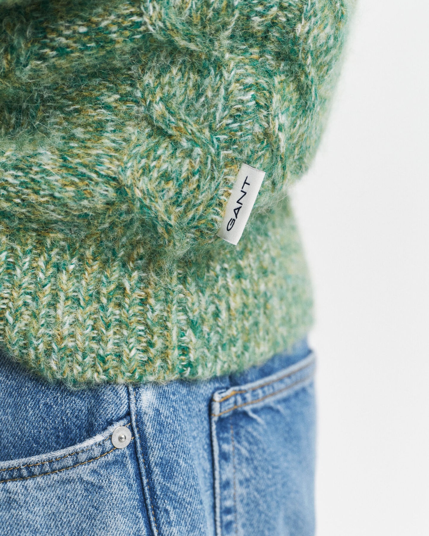 Pull ras du cou en maille torsadée