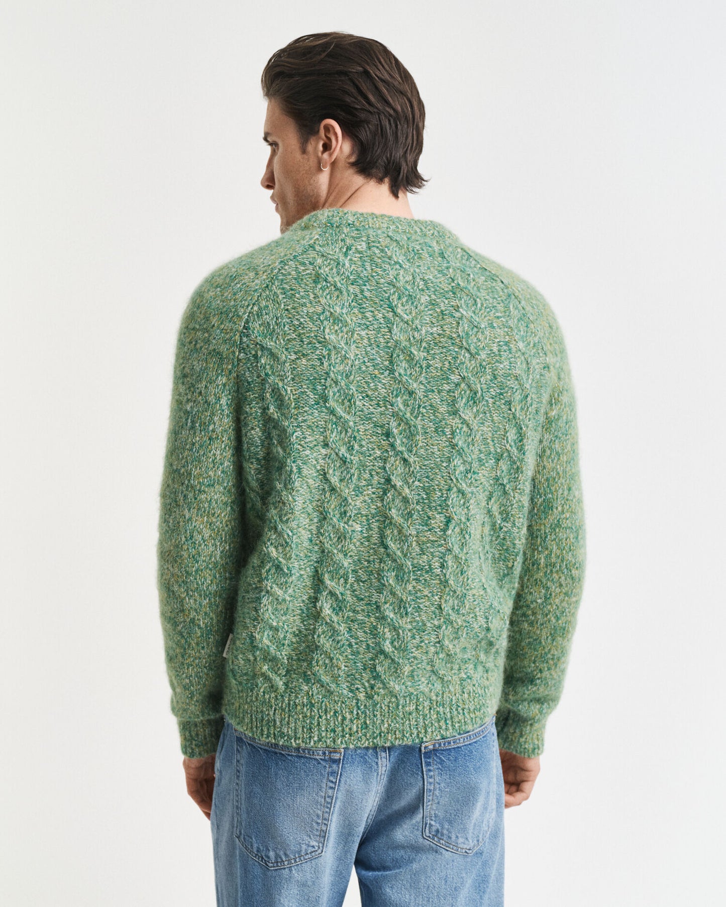 Pull ras du cou en maille torsadée